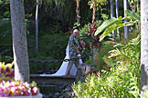 Jodie's dad escorts her across the bridge and to the garden.