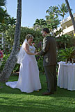 Alan and Jodie hold hands and look at each other.
