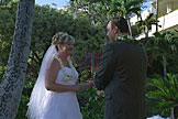 Alan gently puts Jodie's wwedding ring on her finger.