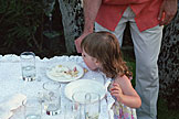 Craig feeds Sarah some wedding cake.