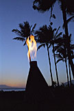 Hawaiian tiki torch at sunset.