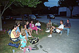 Destiny (back facing), Susan Haerr, Laurie, Jodie, Tammy, Mom, Craig, Alan, and Chad talk during a break in the basketball action.