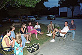 Destiny (back facing), Susan Haerr, Laurie, Jodie, Tammy, Mom, Craig, Alan, and Chad talk during a break in the basketball action.