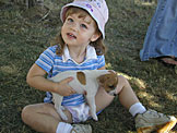 Sarah plays with Taylor, Jodie's new dog.