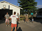 Dan, cousin Shannon Haerr, Alan, and Craig wait until Sarah runs off the court before the ballgame can resume.