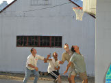 Chad, cousin Jason Rassi, Craig, and Alan box out for what looks like another Shannon brick.