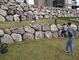 Joel, Taylor, Seth, Todd, Alan, and Craig play around in the back yard.