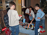 Joe, Chad, Laurie, Todd, and Seth survey the boy's loot.