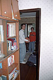 Makato and Kan clown around in Makato's room