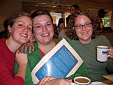 Kyann, Beth and Katy sip on some hot joe as they wait for their hot cakes.