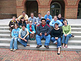 Jeremy, Katy, Kirsten, Derrick, Kyle, Kristi, John, Dan, Leo, Abe, Nick, Erica, Beth and Kyann outside the library.