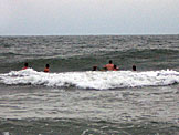 John, Kyle, Kelby, Nick, Erica, and Kirsten wait for the next big wave.