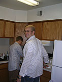 Jeremy and Kelby help prepare a gourmet meal.