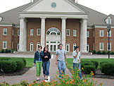 Kirsten, Erica, Jon, and Kyle leave the Communication Building.