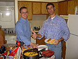 Abe and Dan give their approval for the meal.