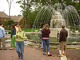 Nick, Kirsten, Derrick, Kyann, Kary, Beth, and Jeremy mill around while we wait for the guy in the background to get off the phone so we can ask him to take our picture.