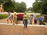Dan, Derrick, Jeremy, Kyann, Jon, Beth, Katy, Kristi, and Abe approach the Law Building.  Kristi wonders what she can do with the red berries she just picked from the bush.