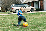 Cailer playing wiih a soccer ball.