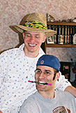 Dan and Jeremy trying to take some things for the road (hat and pen).