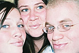 The girls are having fun with lip gloss.  Kirsten, Erica, Kelby