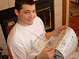 Sam reading the comics.