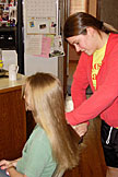 I think I see a few split ends...we'll just cut those off.  Kristi, Erica.
