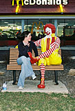 Kirsten enjoys being flattered by Ronald.