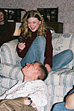 Jeremy laughs at Christy because he tricked her into answering her phone with the sneaky auto-dial maneuver.