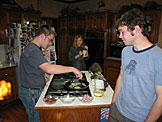Abe and Mark ready the ingredients for breakfast.  Christy is still waking up.