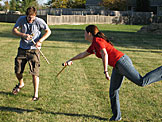 Mark and Kirsten take a break from the action to dual with swords.