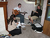 Mark and Jeremy get ready for their concert while Erica helps out.