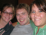 Kirsten, Mark, and Erica have a goodbye hug.
