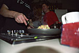 Mark cooks up some eggs.