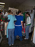 The ladies try on a few outfits.