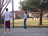 Jeremy and Katy wait for the basketball to come down.
