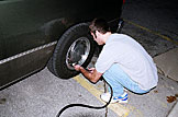 Dan adds a lot of air to the newly named van, "Squatting Buffalo"
