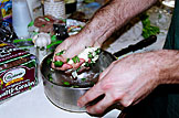Dan makes the fresh garlic and basil butter for the bread.  Yes, his hands are washed.