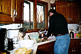Dennis does strong work on the dishes.  A fresh batch of pastry perfection cools on the counter.