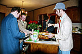 Mark, Abe, and Kyle get everything ready as Dan plates the main dish.
