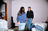 Kirsten tries to be sneaky with her gift of a sippy-cup for Dennis.