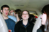 Dan desperately tries to teach Katy how to whistle.  No dice.