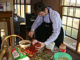 Mark adds yet another layer of sauce.   Mmmmmm.
