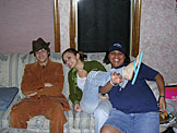 Jon, Karina, and Natalie Peake clown around.  They are neighbors of the Miller's.