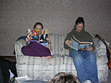 Kristi reads a bridal magazine while Ruthie reads a little Dilbert.  Things that make you go hmmmm.