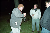 Derrick Kipfer loads the cannon with powder.  He will fire the cannon off at the stroke of midnight.