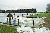 Jeremy watches the guys break up the ice so we can go swimming.