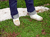Kristi with her killer boots.  Something about the hole in the lining on the top of her right boot has me guessing that they aren't water proof.