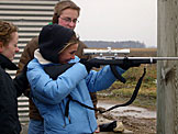 Blessing starts enjoying herself on the second clip of ammo.  Kristi and Abe make sure the shells go down range.