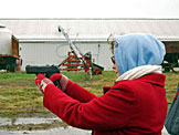 Katy shows her small aggressive side by blowing random things sky high with her killer aim.