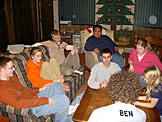 Abe, Kinsey, Jeremy (all three on couch), Leo (on chair), Dan, Ben (with the shirt that, yeah...ummm....says Ben on it), Korinn (in pink), and Kailey intently watch the magnets spin faster and faster.